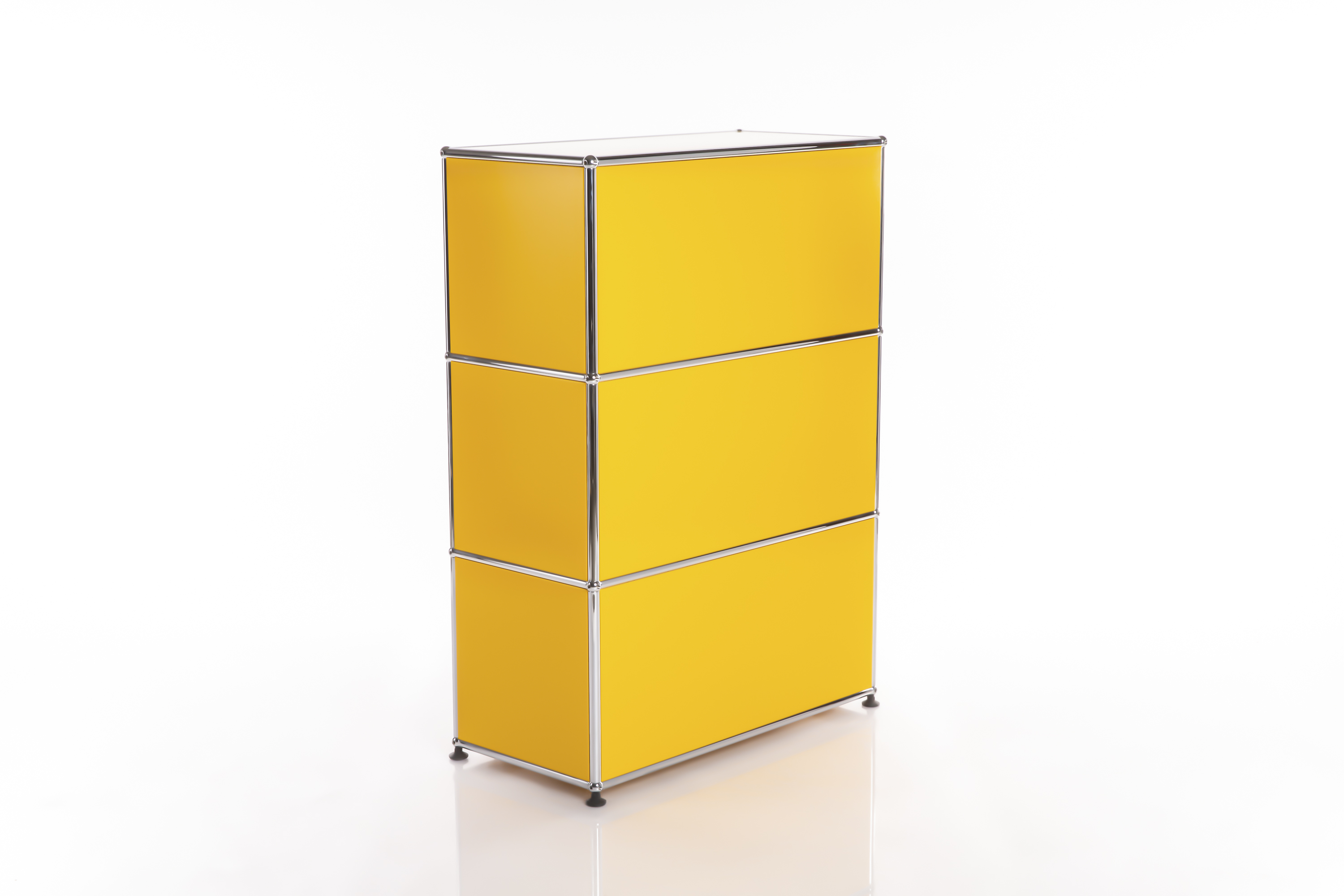 A sleek, modular shelving unit in bright yellow, comprising three stacked cube-shaped segments. Rich yellow sides, framed by a shiny silver metal frame. Resting on small black feet, set against a light-coloured background.